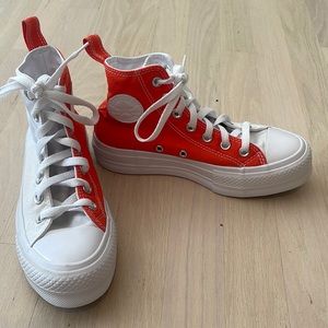 Women’s customized red and white high top platform converse. Size 5.5.